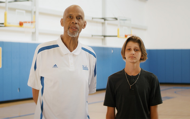 Kareem Abdul-Jabbar with Jared standing on basketball court - #WeLoveAHealthyLA